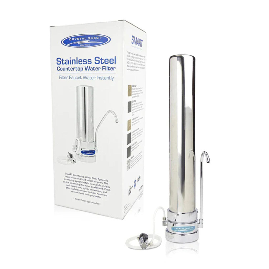 Crystal Quest stainless steel countertop water filter with packaging on a white background