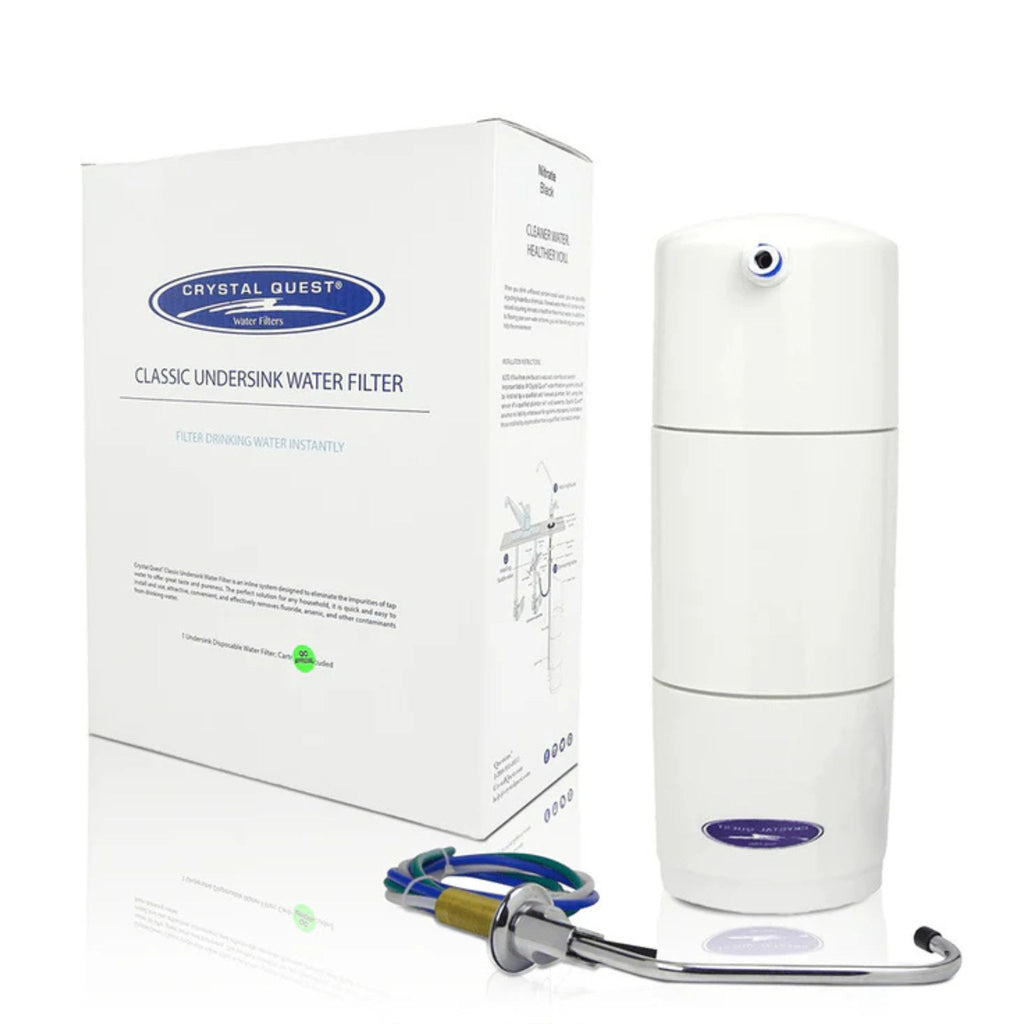 Crystal Quest water filter system with packaging on a white background